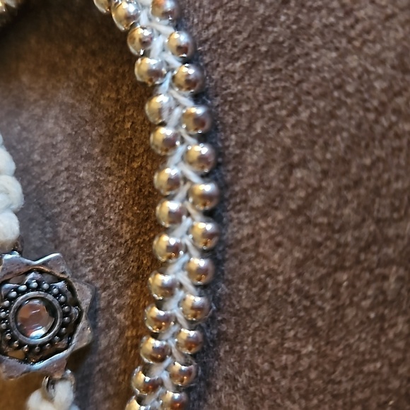 3/$30 Set of Two Ivory Floral Silver Beaded Macrame Adjustable Bracelets - Picture 4 of 5